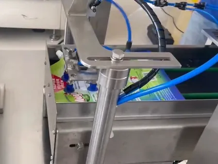 Llenadora de bolsas verticales con boquilla para lavavajillas